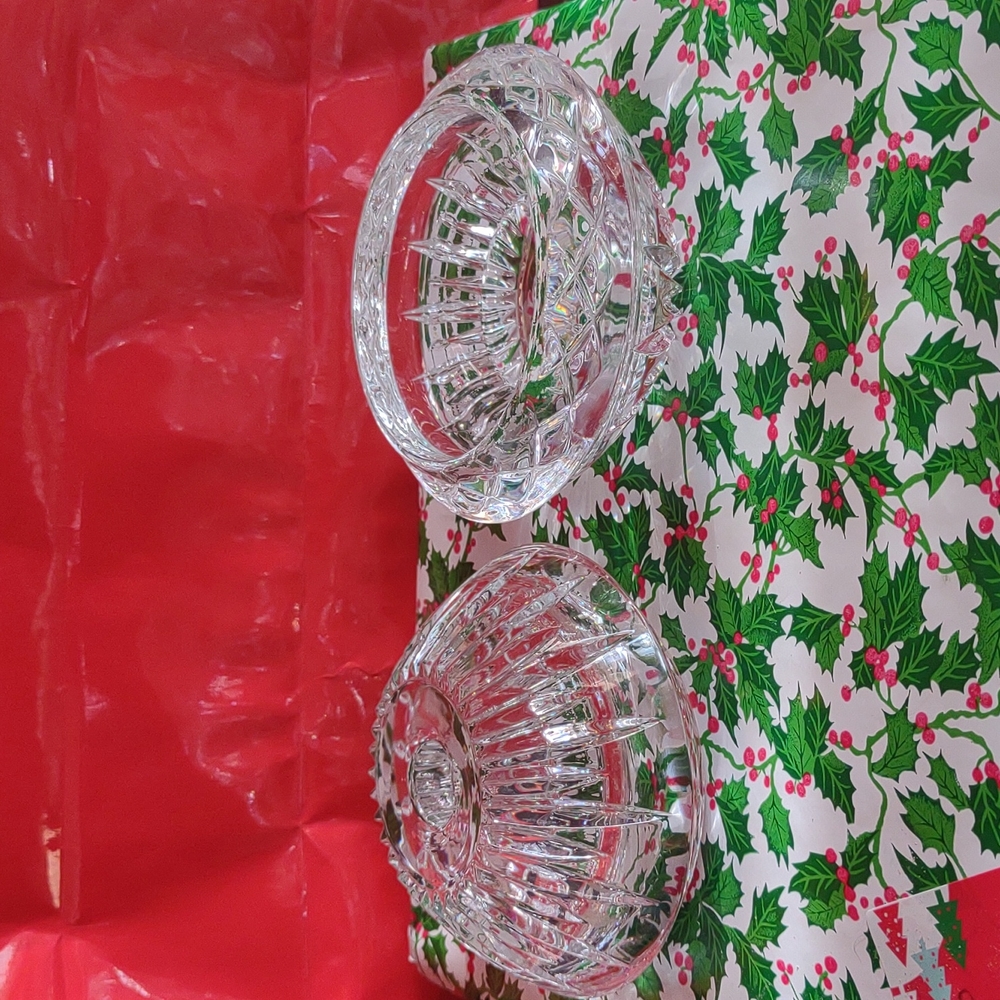 Crystal candle holders, may be used for large or taper candles. Never used